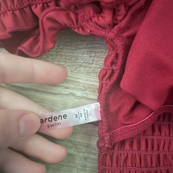 Selling a off the shoulders, burgundy swim top. Size M in kids I believe. - Picture 3 of 3